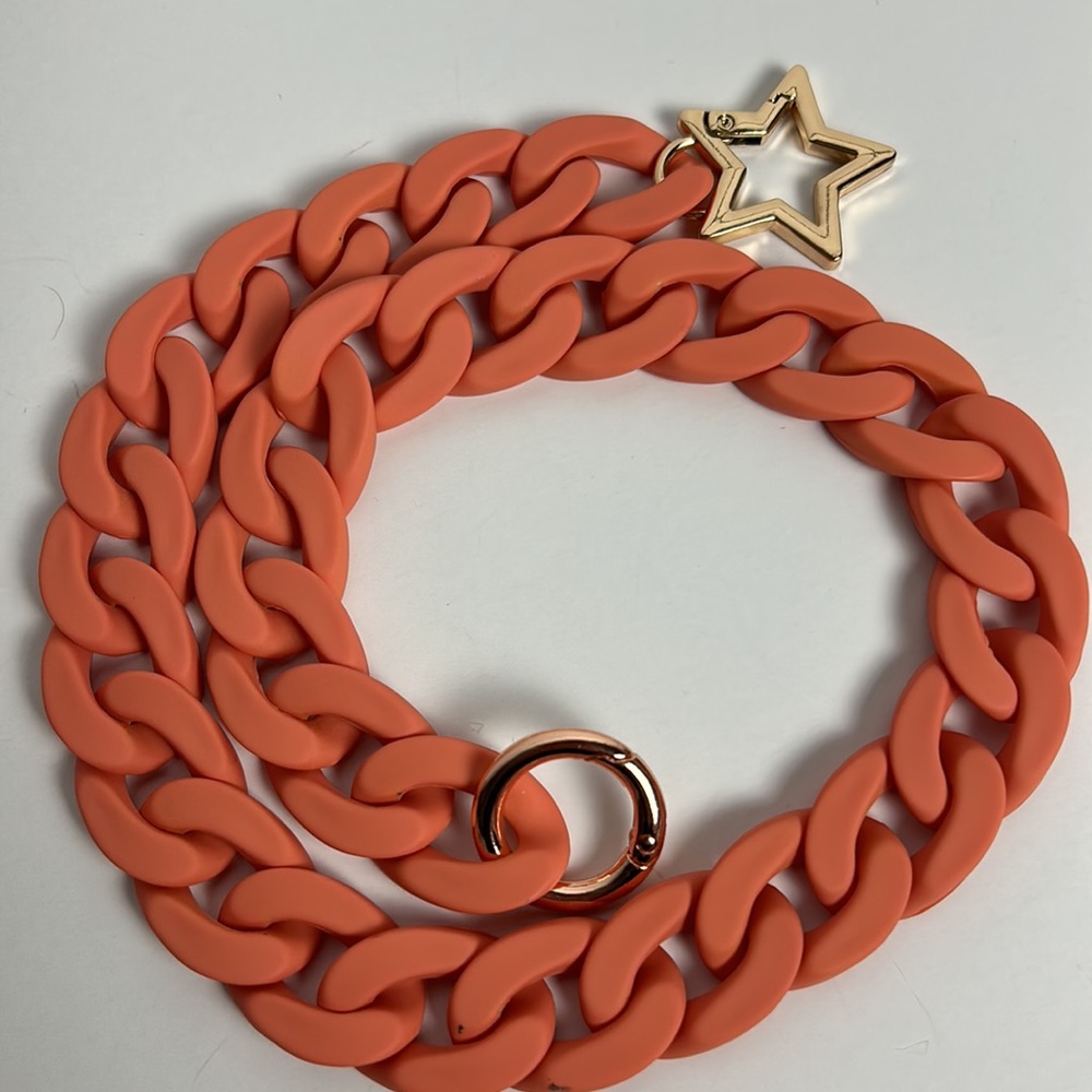 Orange with gold star and rose gold loop hardware